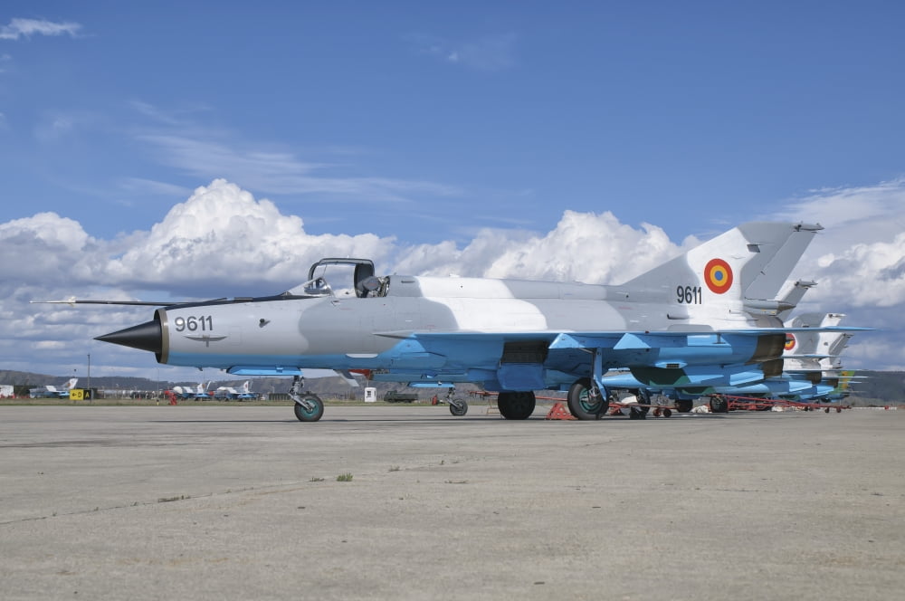 A Romanian Air Force MiG-21C airplane at Camp Turzii Air Base Romania Canvas Art - Giovanni CollaStocktrek Images (34 x 23)