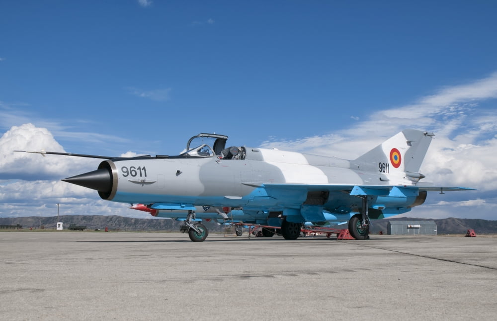 A Romanian Air Force MiG-21C airplane at Camp Turzii Air Base Romania Canvas Art - Giovanni CollaStocktrek Images (35 x 23)