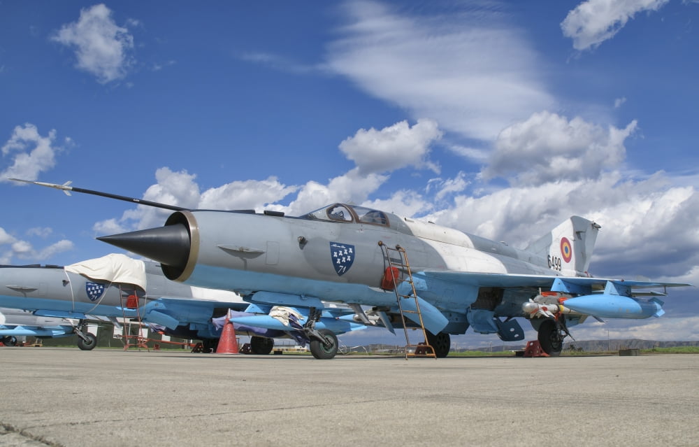 A Romanian Air Force MiG-21C airplane at Camp Turzii Air Base Romania Canvas Art - Giovanni CollaStocktrek Images (35 x 23)