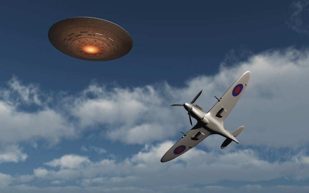 A Royal Air Force Supermarine Spitfire aircraft giving chase to a UFO Canvas Art - Mark StevensonStocktrek Images (36 x 23)