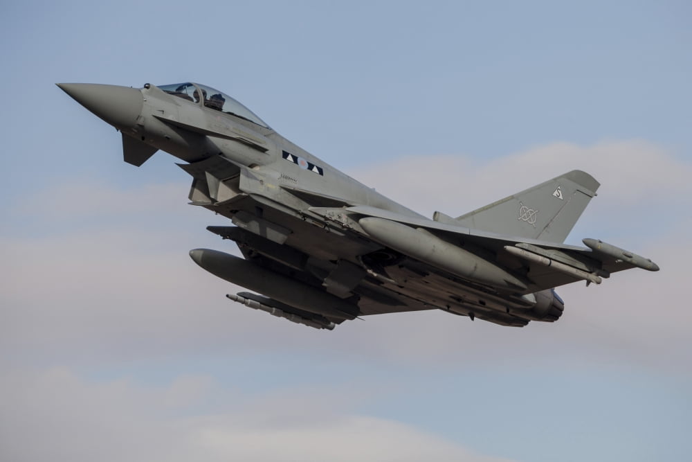 A Royal Air Force Typhoon fighter jet taking off Canvas Art - Timm ZiegenthalerStocktrek Images (34 x 23)