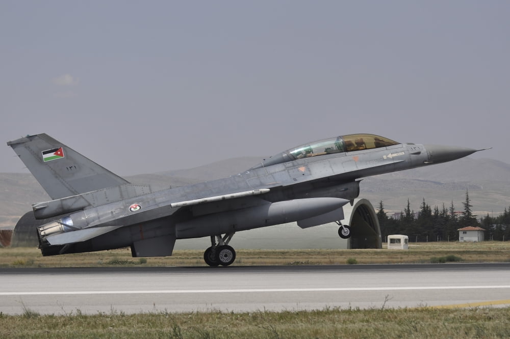 A Royal Jordanian Air Force F-16AM aircraft landing at Konya Air Base Turkey Canvas Art - Giorgio CiariniStocktrek Images (34 x 23)