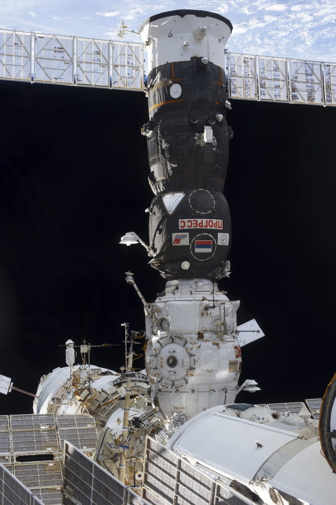 A Russian Progress spacecraft docked to the International Space Station Canvas Art - Stocktrek Images (23 x 34)