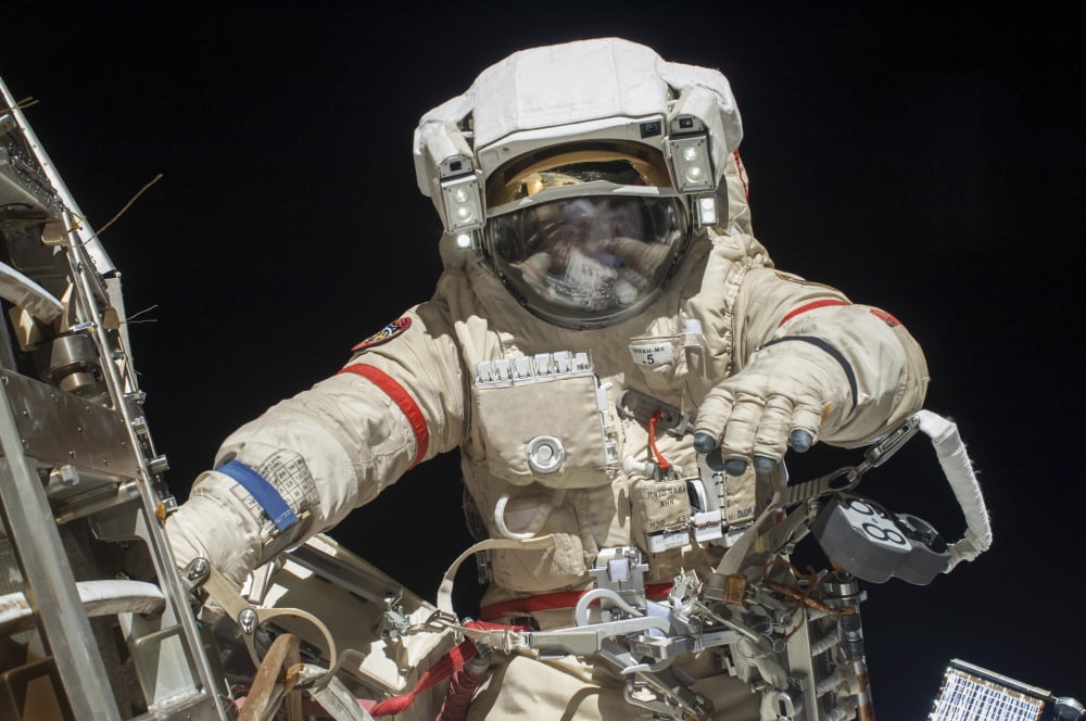 A Russian cosmonaut during a spacewalk Canvas Art - Stocktrek Images (34 x 23)