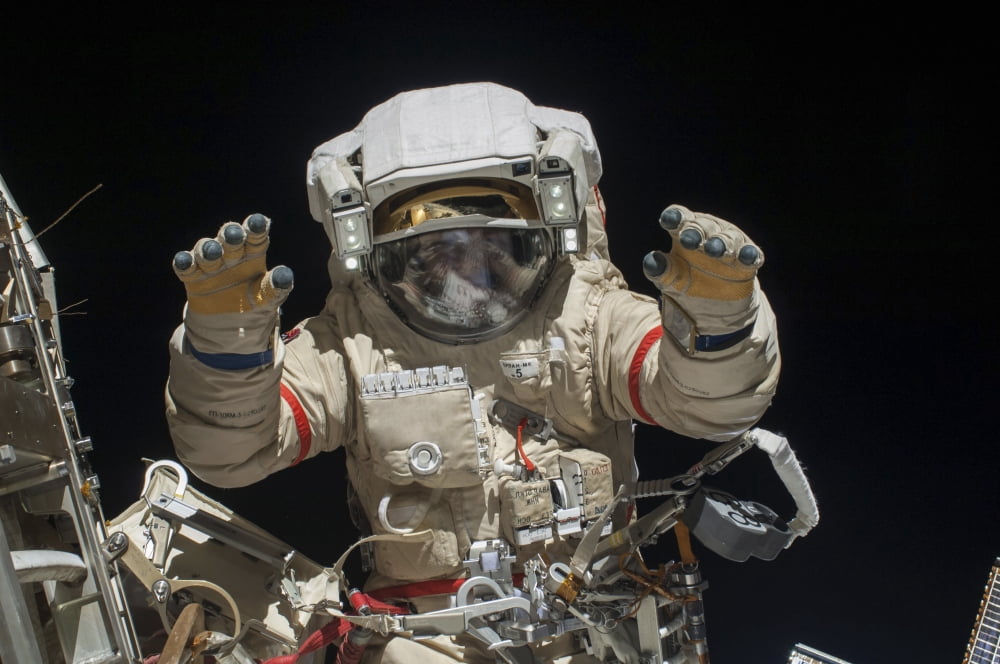 A Russian cosmonaut during a spacewalk Canvas Art - Stocktrek Images (34 x 23)