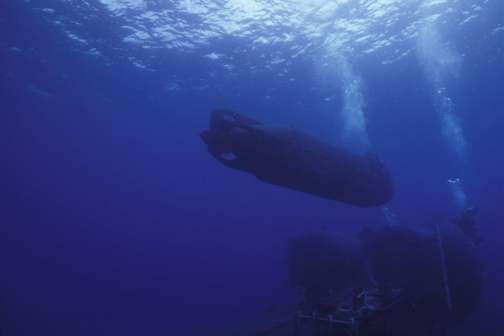 A SEAL Delivery Vehicle approaches the Dry Deck Shelter aboard USS Kamehameha Canvas Art - Michael WoodStocktrek Images (18 x 12)