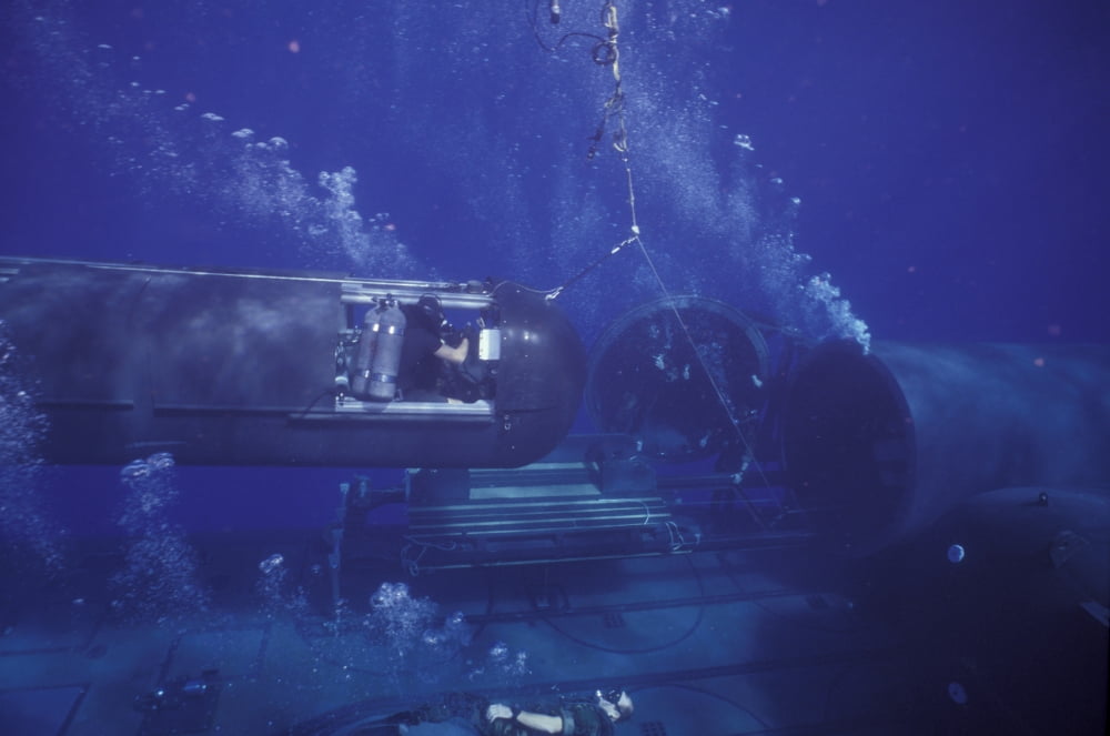 A SEAL Delivery Vehicle on tether connected to the dry deck shelter on USS Kamehameha Canvas Art - Michael WoodStocktrek Images (35 x 23)