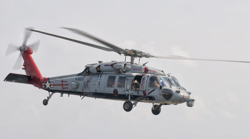 A SH-60 helicopter in flight over the Persian Gulf Canvas Art - Giovanni CollaStocktrek Images (19 x 11)