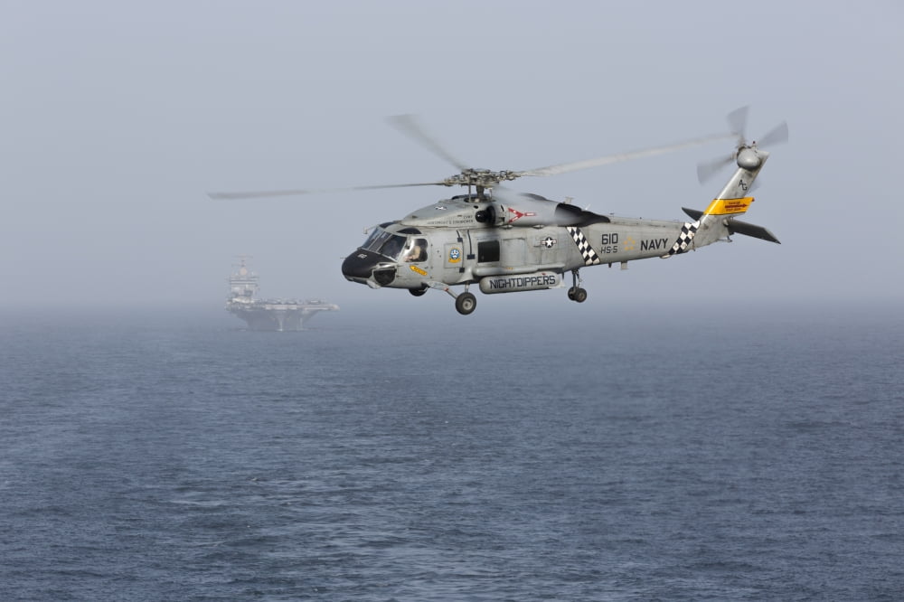 A SH-60J Seahawk during a vertical replenishment in the Arabian Sea Canvas Art - Gert KromhoutStocktrek Images (35 x 23)