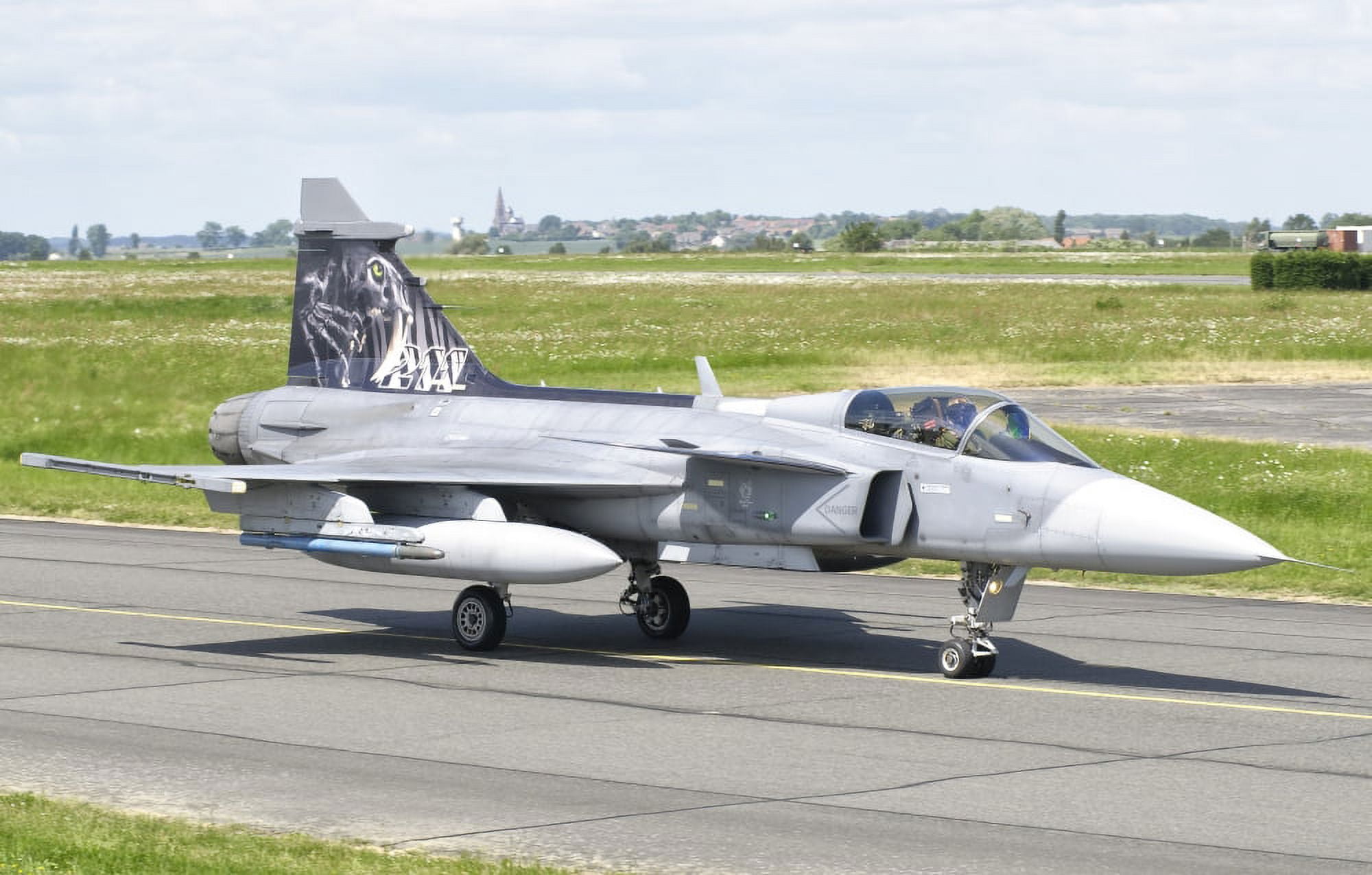 A Saab JAS-39 Gripen of the Czech Air Force on the flight line at Cambrai Air Base France Canvas Art - Giovanni CollaStocktrek Images (36 x 23)