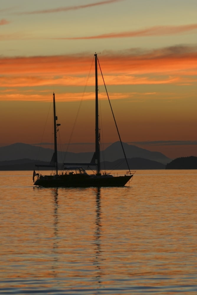 A Sailboat Is Anchored For The Night In The Gulf Islands Of British Columbia Sunset Canada Summer Canvas Art - John Delapp Design Pics (22 x 34)