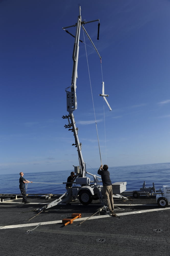 A Scan Eagle unmanned aerial vehicle is recovered after a successful mission Canvas Art - Stocktrek Images (23 x 35)
