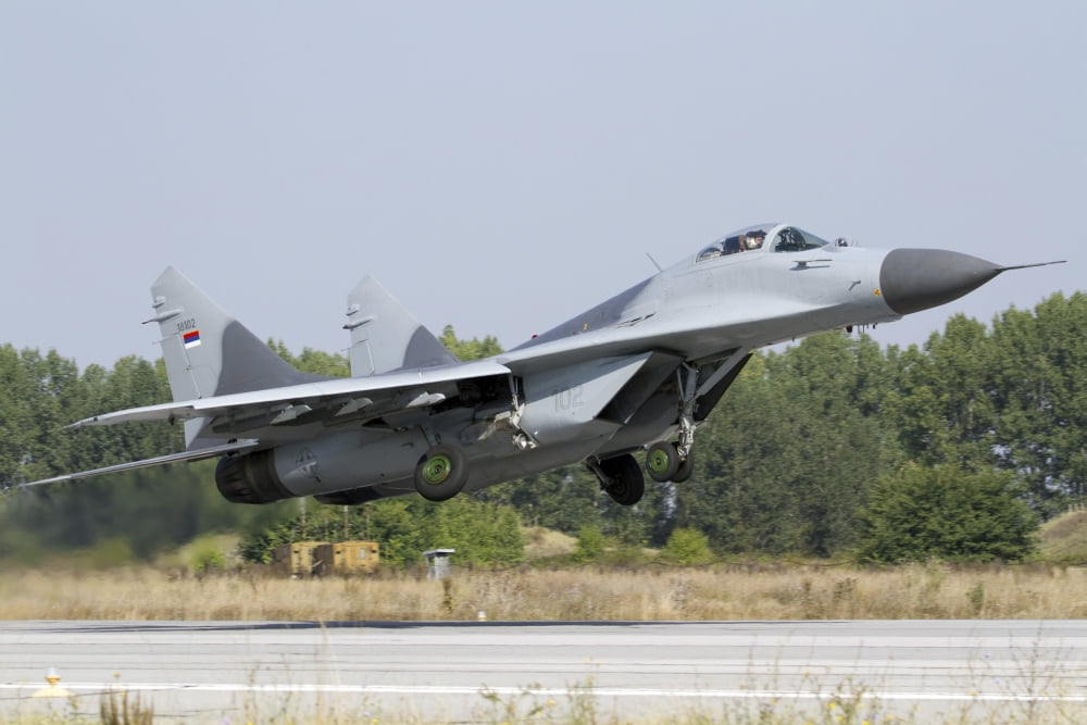 A Serbian Air Force MiG-29 departing from Graf Ignatievo Air Base Canvas Art - Anton BalakchievStocktrek Images (35 x 24)