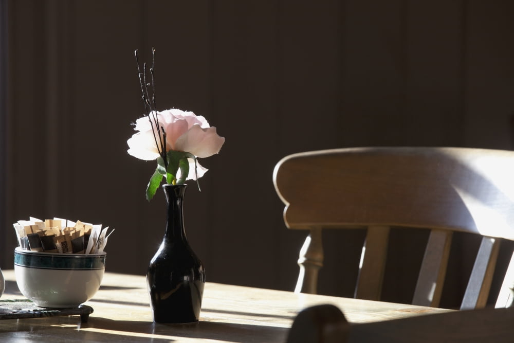 A Single Rose Sits In A Small Vase On A Restaurant Table Northumberland England Canvas Art - John Short Design Pics (19 x 12)
