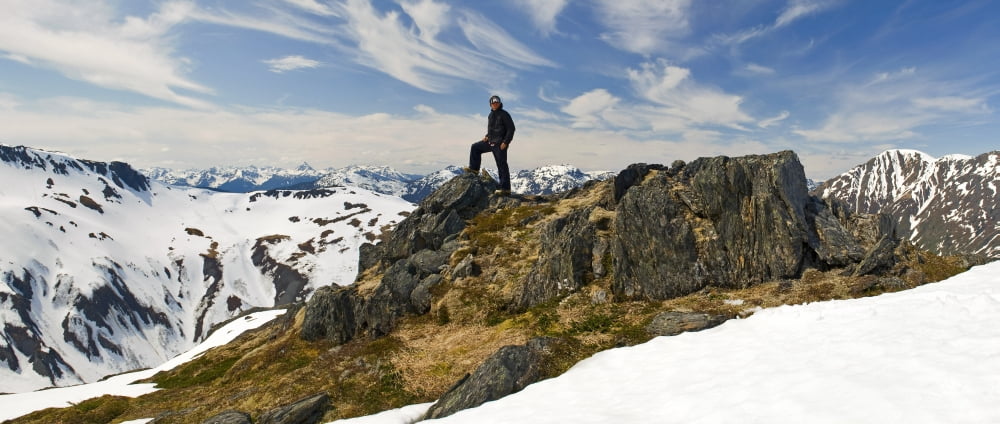 A Snowboarder Takes A Moment To Enjoy The View While Heliskiing Near Juneau Alaska Canvas Art - Chris Miller Design Pics (26 x 11)