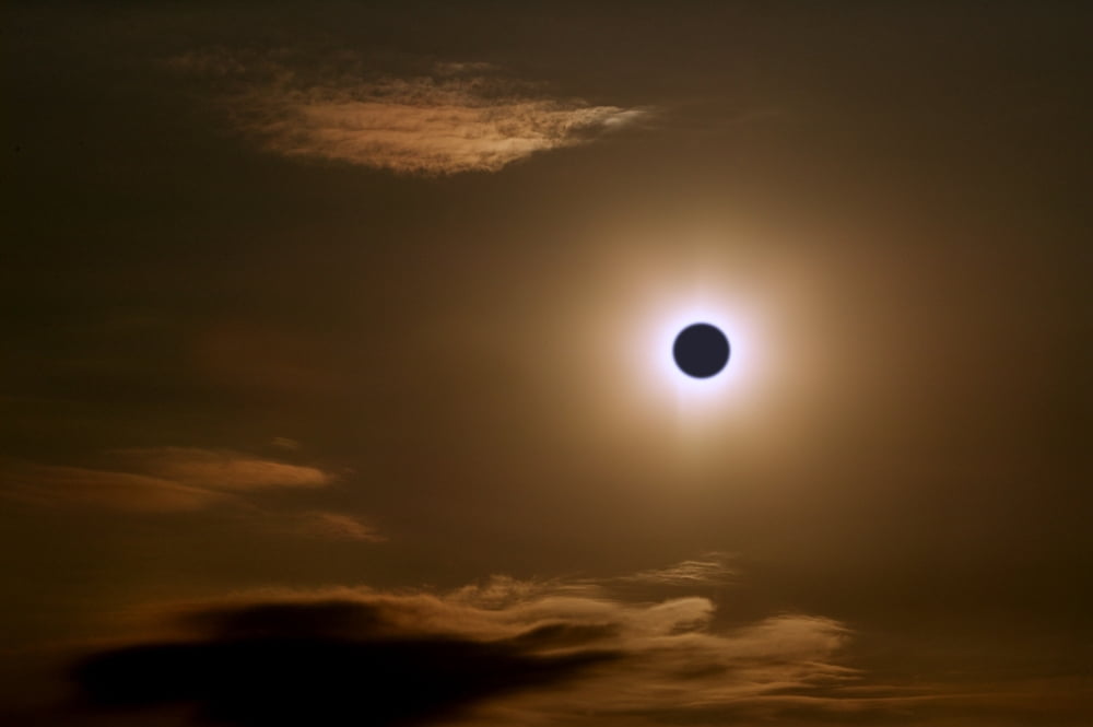A Solar Eclipse Canvas Art - Con Tanasiuk Design Pics (34 x 22)