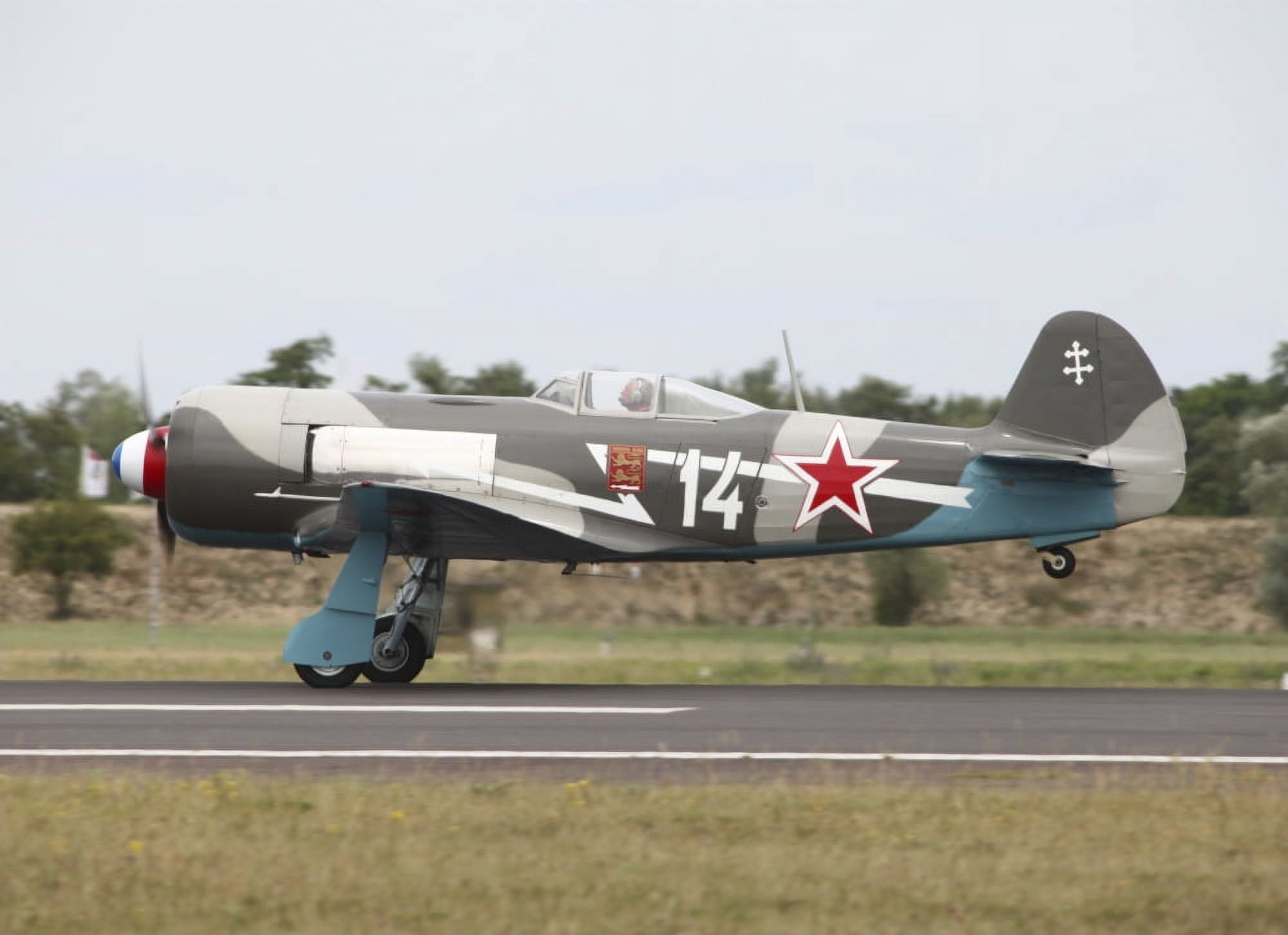 A Soviet Yakovlev Yak-11 warbird Canvas Art - Timm ZiegenthalerStocktrek Images (33 x 24)