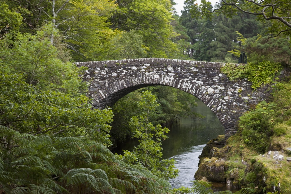 A Stone Bridge Crossing A River Argyl Scotland Canvas Art - John Short Design Pics (38 x 24)