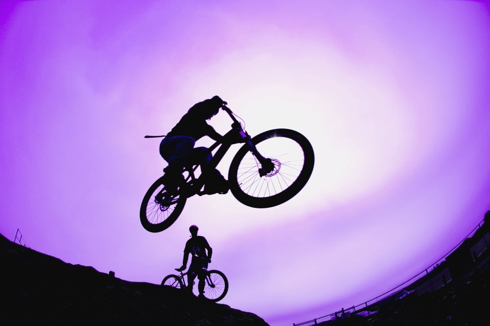 A Stunt Cyclist Silhouette Canvas Art - Corey Hochachka Design Pics (17 x 11)