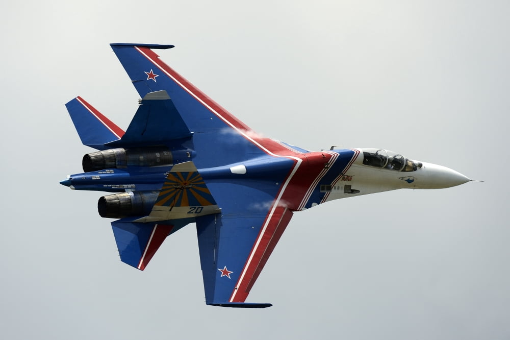 A Sukhoi Su-27 Flanker of the Russian Knights aerobatic team Canvas Art - Remo GuidiStocktrek Images (18 x 12)