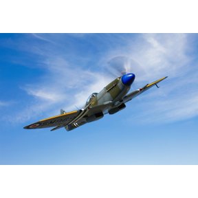 A Supermarine Spitfire Mk-18 in flight Canvas Art - Scott GermainStocktrek Images (35 x 23)