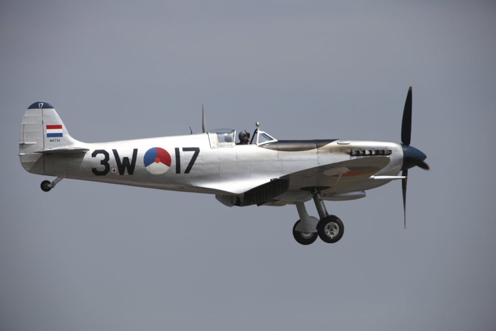 A Supermarine Spitfire of the Dutch historic flight team Canvas Art - Timm ZiegenthalerStocktrek Images (35 x 23)