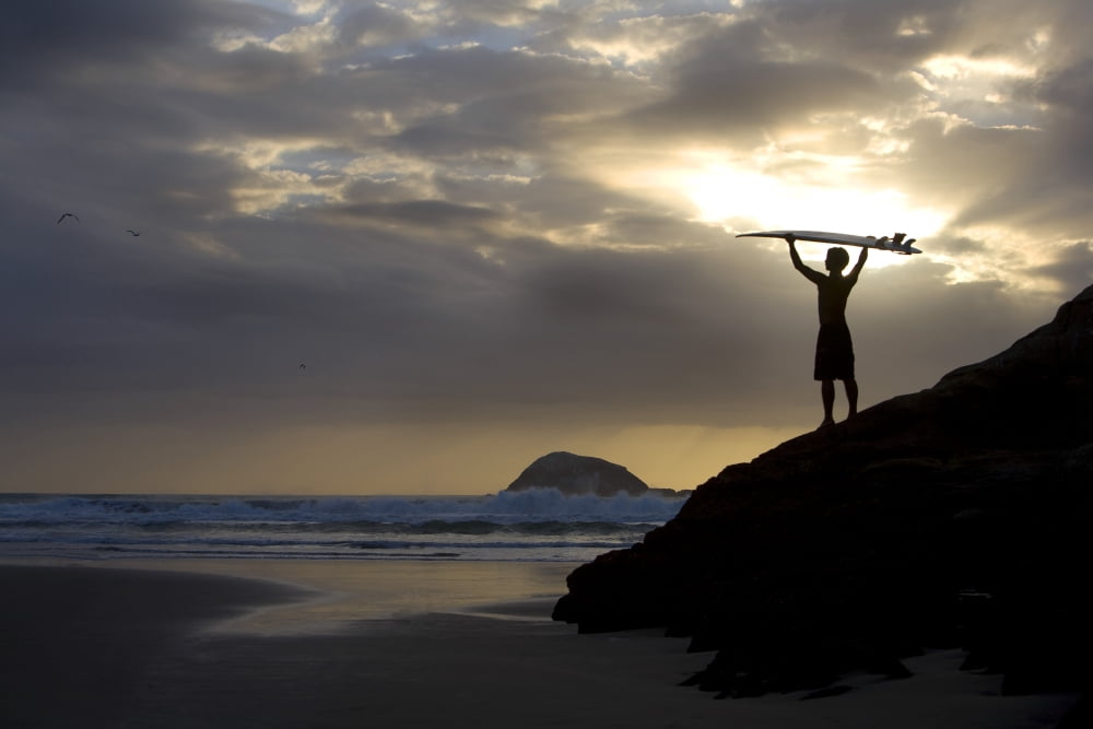 A Surfer On Muriwai Beach New Zealand Canvas Art - Deddeda Design Pics (17 x 11)