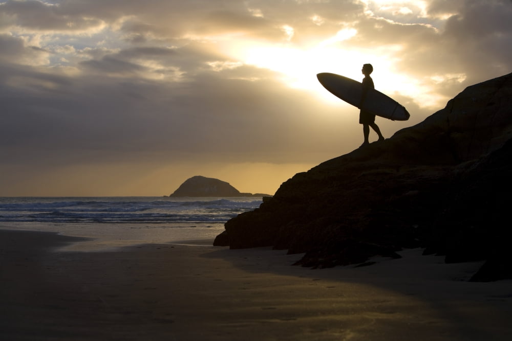 A Surfer On Muriwai Beach New Zealand Canvas Art - Deddeda Design Pics (34 x 22)