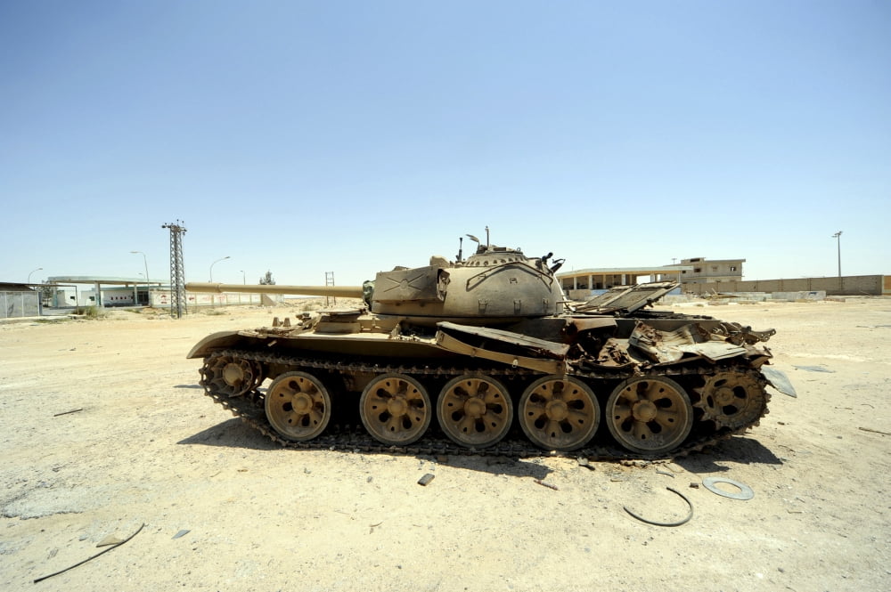 A T-55 tank destroyed by NATO forces in the desert north of Ajadabiya Libya Canvas Art - Andrew ChittockStocktrek Images (18 x 12)