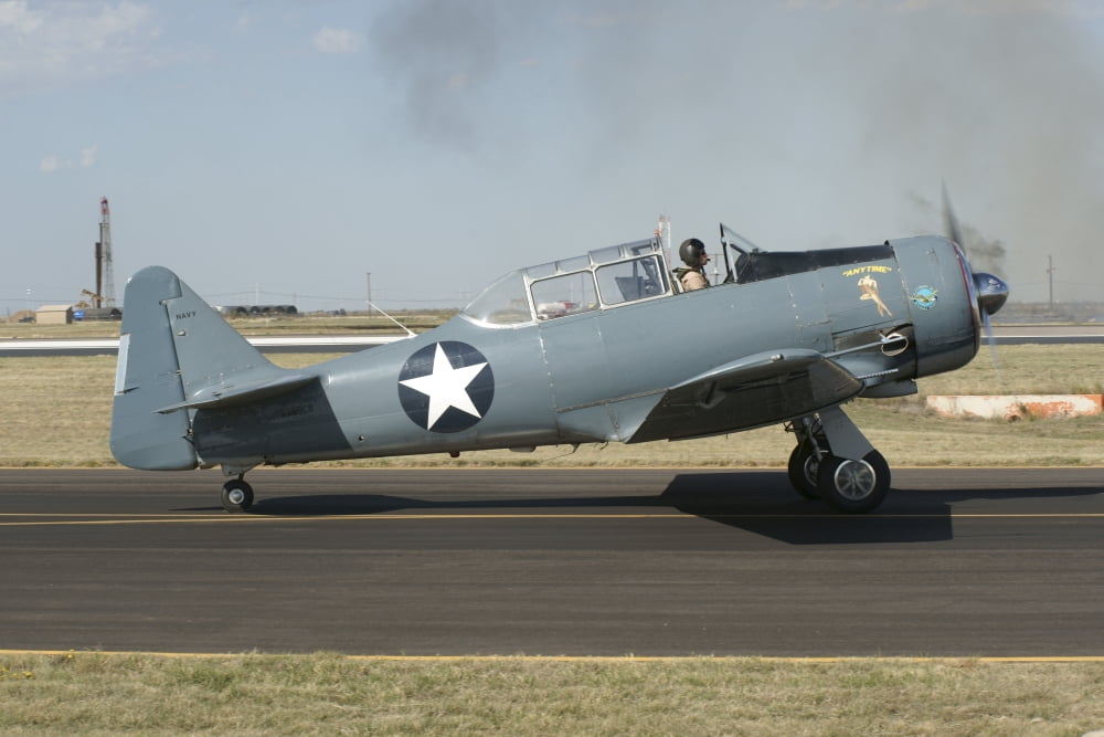 A T-6 Harvard trainer aircraft in Midland Texas Canvas Art - Ramon Van OpdorpStocktrek Images (35 x 24)