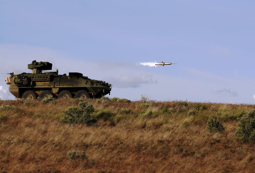 A TOW missile is launched from an armored vehicle Canvas Art - Stocktrek Images (34 x 23)