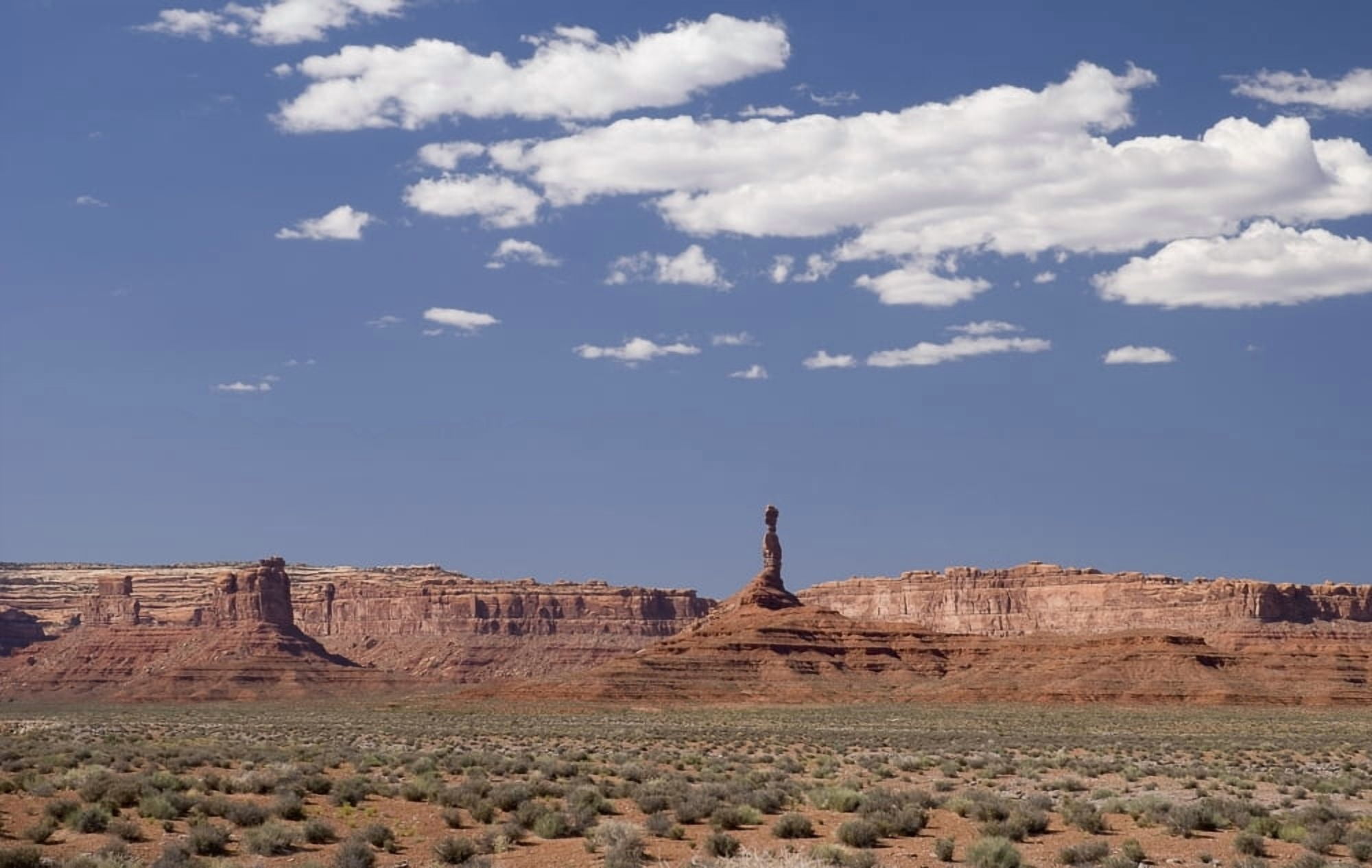 A Tall Rock Formation Along The Cliffs Utah Usa Canvas Art - Philippe Widling Design Pics (19 x 12)