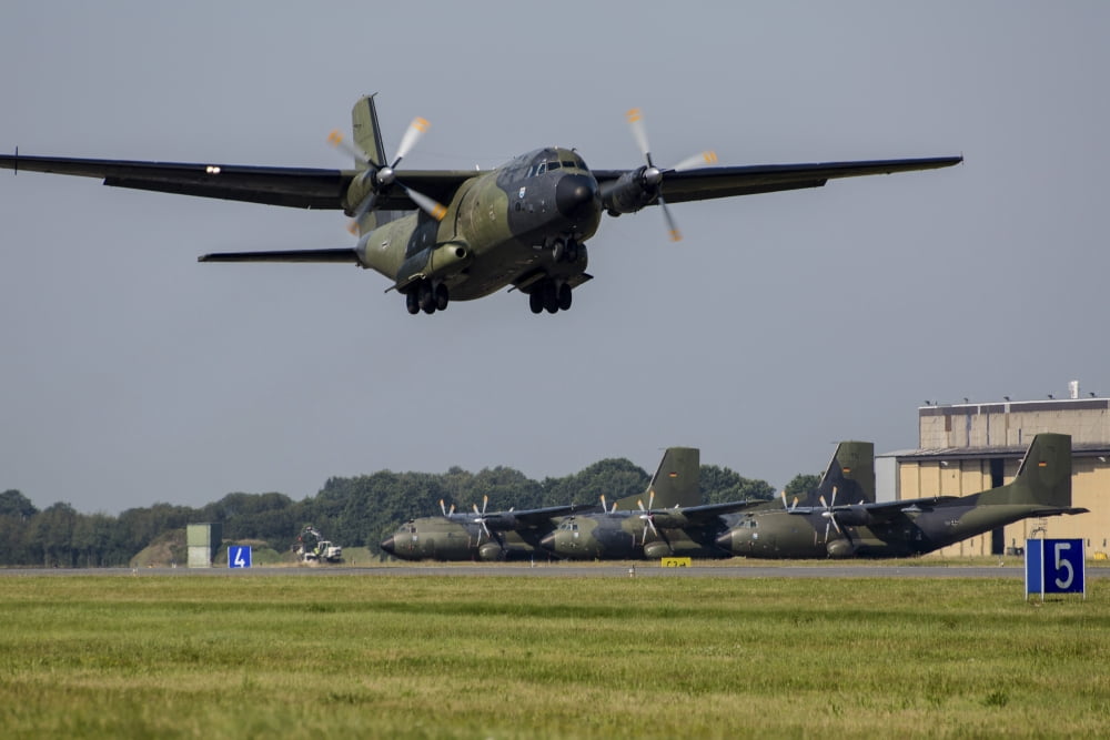 A Transall C-160 transport aircraft of the German Air Force taking off Canvas Art - Timm ZiegenthalerStocktrek Images (34 x 23)