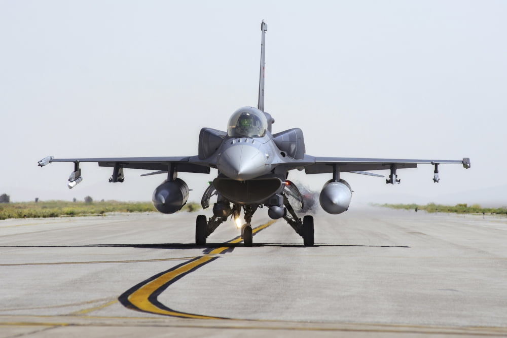 A Turkish Air Force F-16D Block 50 Fighting Falcon on the flight line Canvas Art - Daniele FaccioliStocktrek Images (34 x 23)