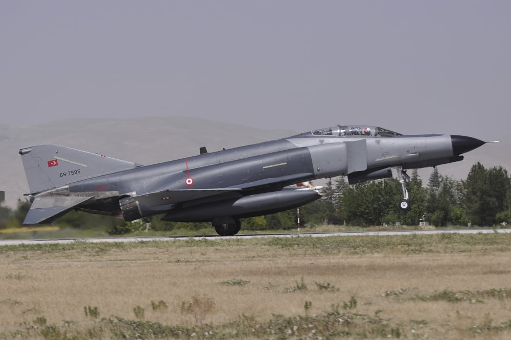 A Turkish Air Force F-4E 2020 Terminator landing at Konya Air Base Turkey Canvas Art - Giorgio CiariniStocktrek Images (17 x 12)
