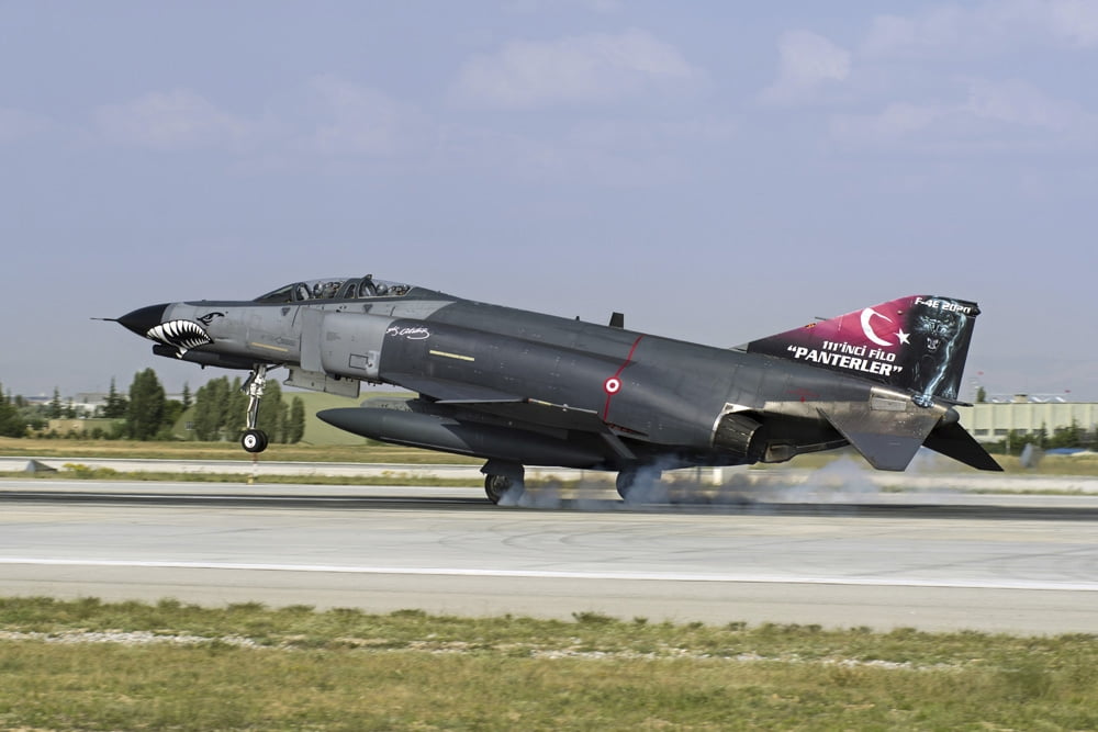 A Turkish Air Force F-4E-2020 Terminator landing on the runway Canvas Art - Daniele FaccioliStocktrek Images (17 x 12)