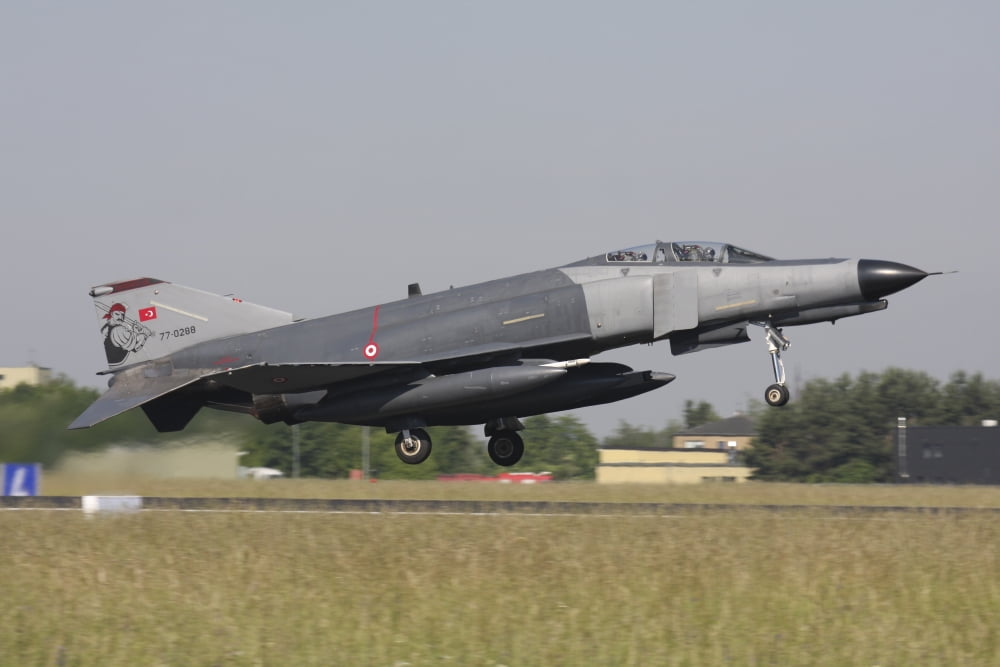 A Turkish F-4E Phantom takes off from Lechfeld Airfield Germany Canvas Art - Timm ZiegenthalerStocktrek Images (18 x 12)