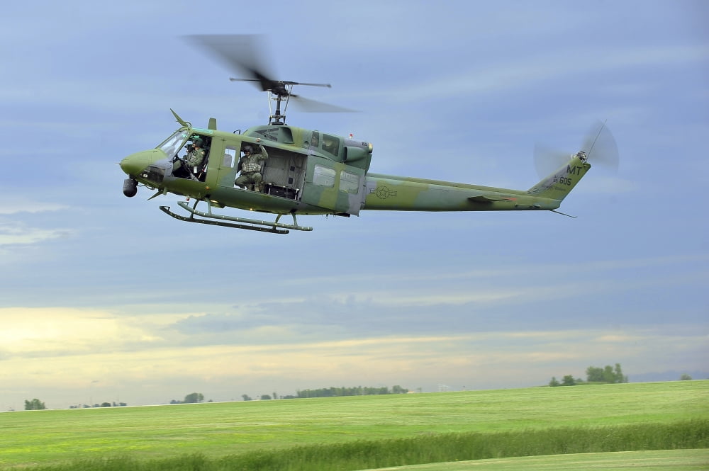A UH-1N Huey helicopter prepares to land at Minot Air Force Base North Dakota Canvas Art - Stocktrek Images (35 x 23)