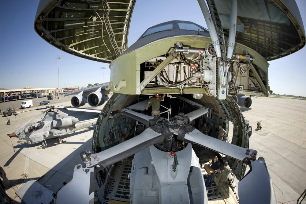 A UH-1Y being winched into a C-5 Galaxy Canvas Art - Stocktrek Images (34 x 23)