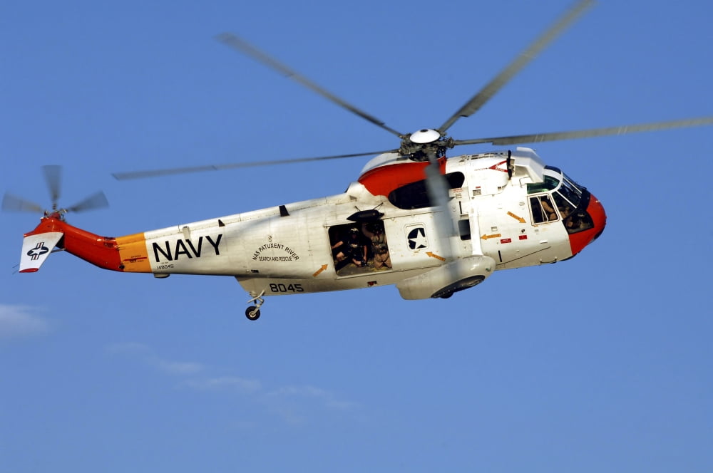A UH-3H Sea King helicopter flies a search and rescue training mission Canvas Art - Stocktrek Images (35 x 23)