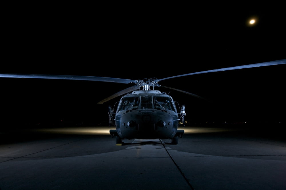 A UH-60 Black Hawk helicopter lit up by multiple external flash units Canvas Art - Terry MooreStocktrek Images (18 x 12)