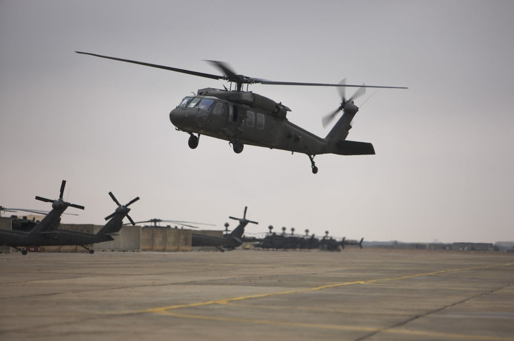 A UH-60 Black Hawk taking off for a mission over northern Iraq Canvas Art - Terry MooreStocktrek Images (35 x 23)