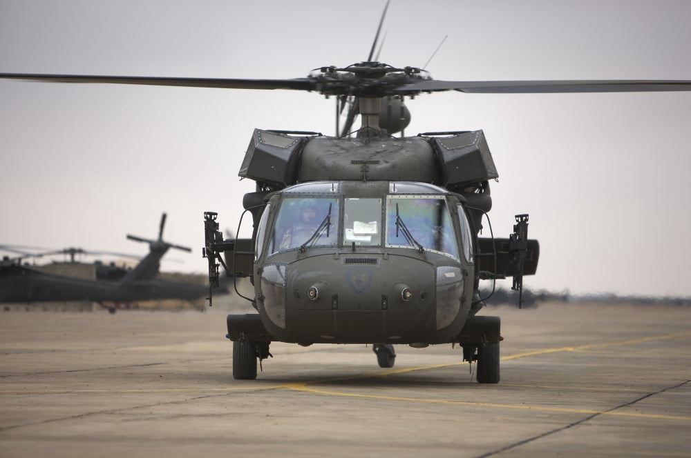 A UH-60 Black Hawk taxis out for a mission over northern Iraq Canvas Art - Terry MooreStocktrek Images (18 x 12)