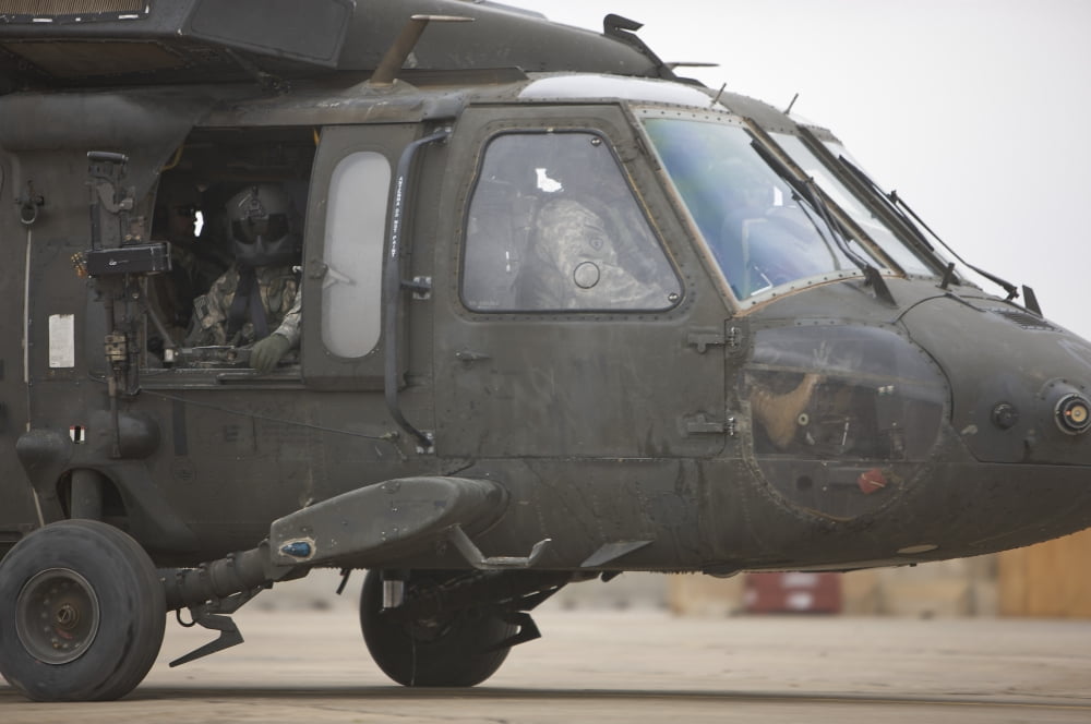 A UH-60 Black Hawk taxis out for a mission over northern Iraq Canvas Art - Terry MooreStocktrek Images (18 x 12)