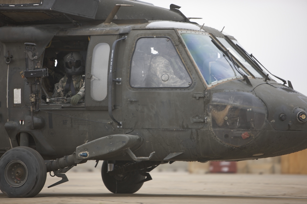 A UH-60 Black Hawk taxis out for a mission over northern Iraq Canvas Art - Terry MooreStocktrek Images (35 x 23)