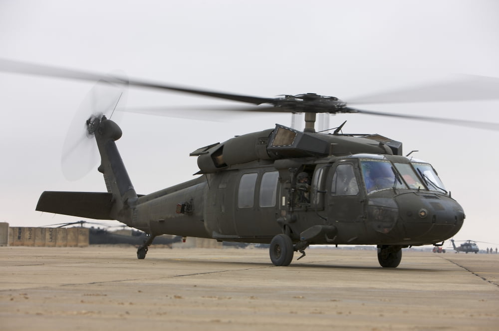 A UH-60 Black Hawk taxis out for a mission over northern Iraq Canvas Art - Terry MooreStocktrek Images (35 x 23)