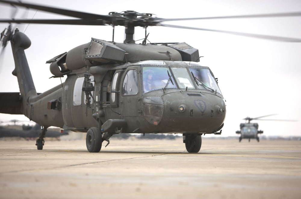 A UH-60 Black Hawk taxis out for a mission over northern Iraq Canvas Art - Terry MooreStocktrek Images (35 x 23)