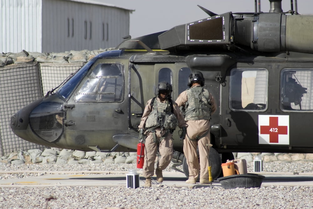 A UH-60 Blackhawk Medivac helicopter refuels at Camp Warhorse after a mission Canvas Art - Terry MooreStocktrek Images (18 x 12)