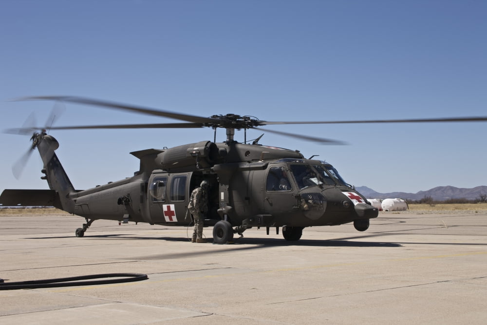 A UH-60 Blackhawk helicopter at Davis-Monthan Air Force Base Canvas Art - Terry MooreStocktrek Images (35 x 23)