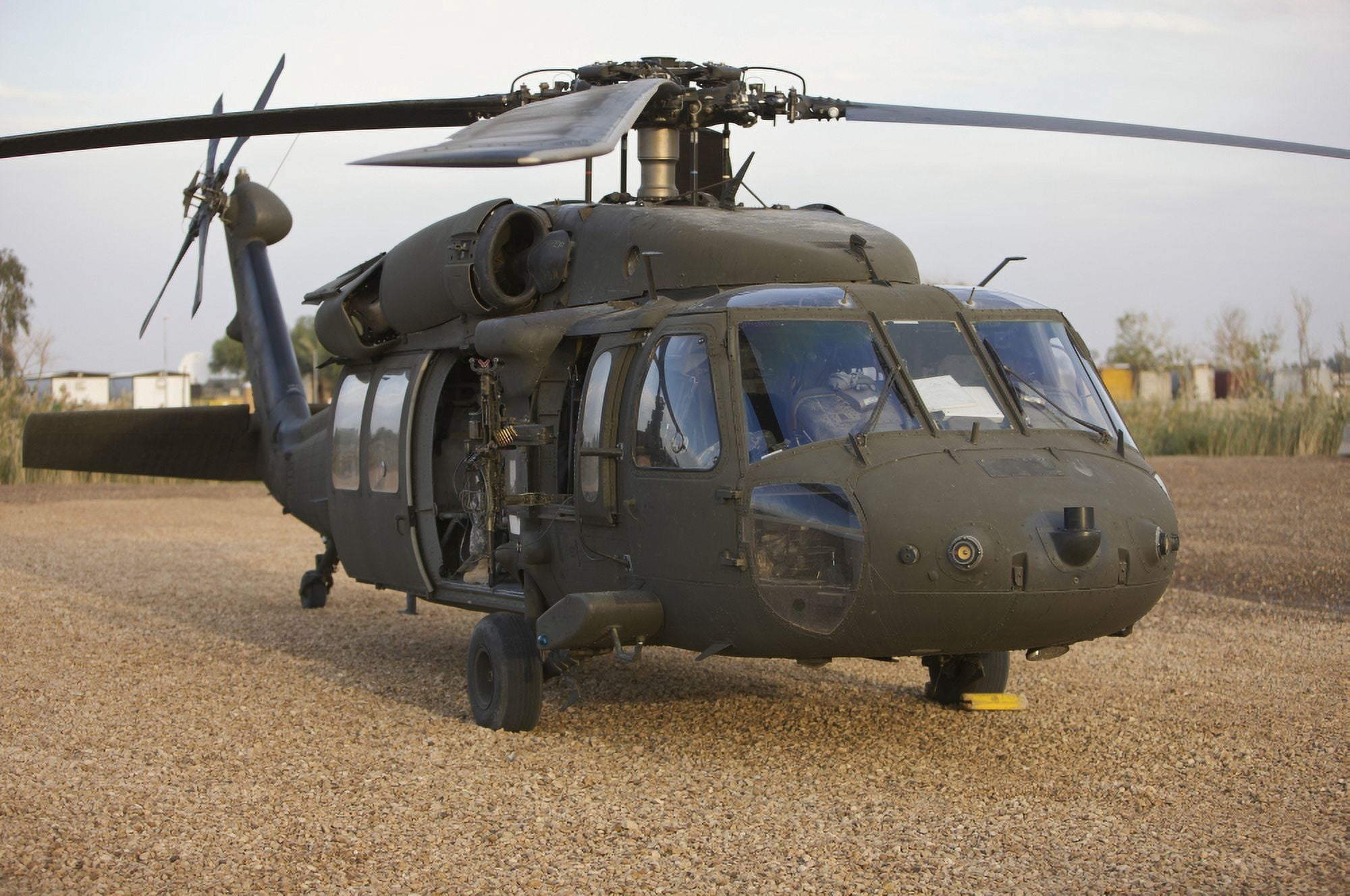 A UH-60L Black Hawk with twin M240G machine guns Canvas Art - Terry MooreStocktrek Images (35 x 23)